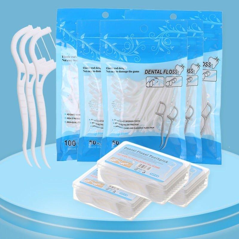 Palillos para usar hilo dental