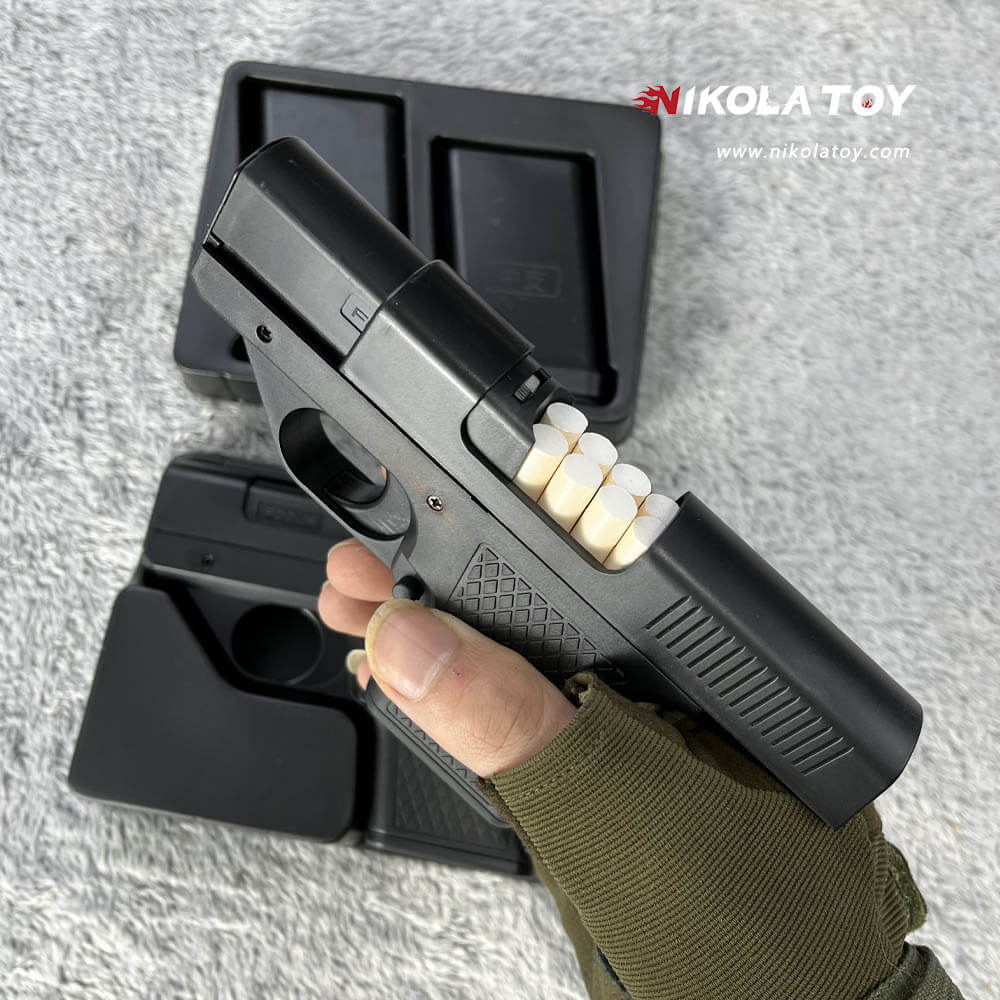 Gun type cigarette lighter with 3 replaceable magazine clips