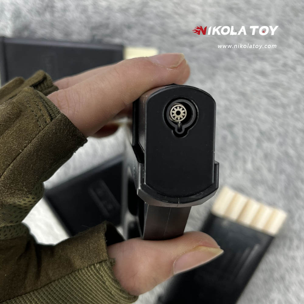 Gun type cigarette lighter with 3 replaceable magazine clips