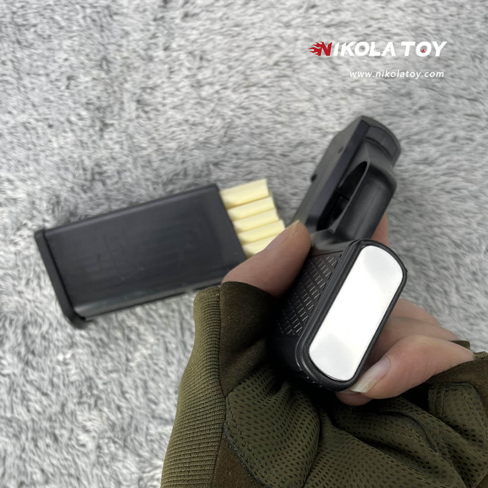 Gun type cigarette lighter with 3 replaceable magazine clips