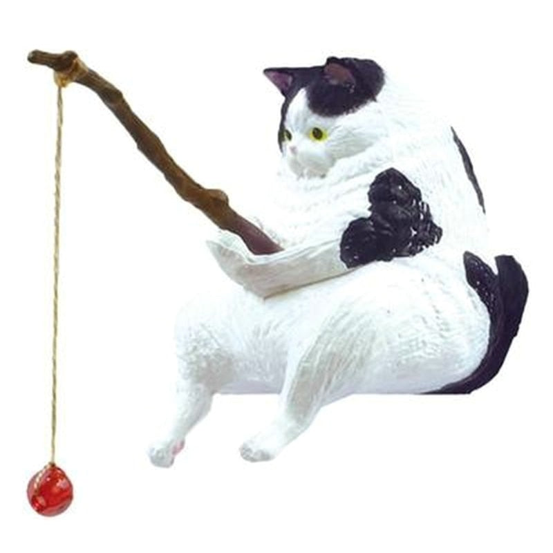 Figura de gato pescador